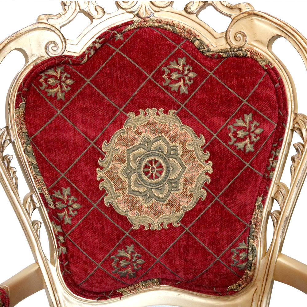 Close up of a Red and Gold Accent Chair